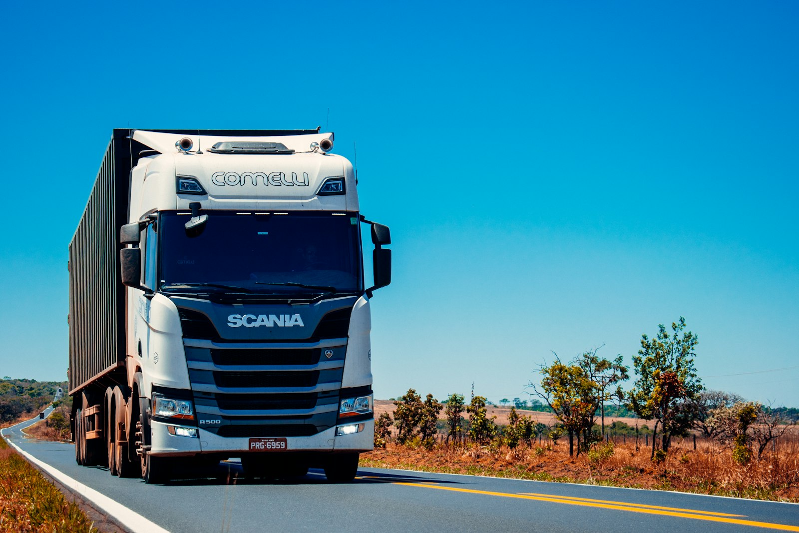 Freight truck moving shipping containers