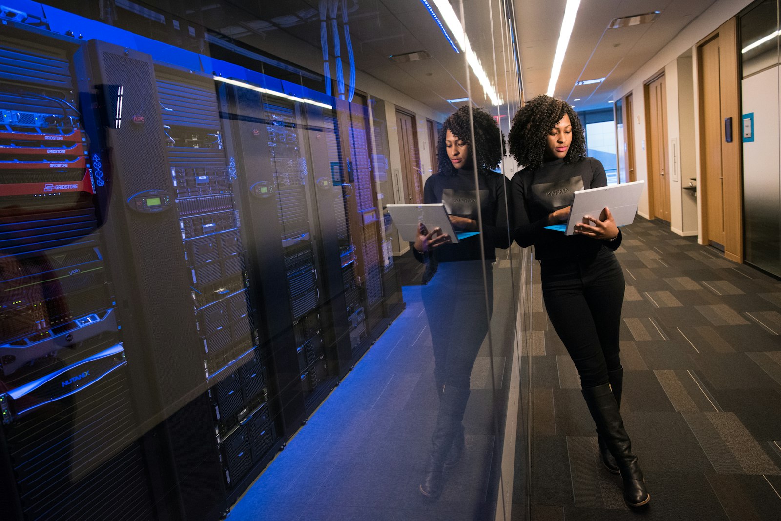 Specialist reviewing data on a large display